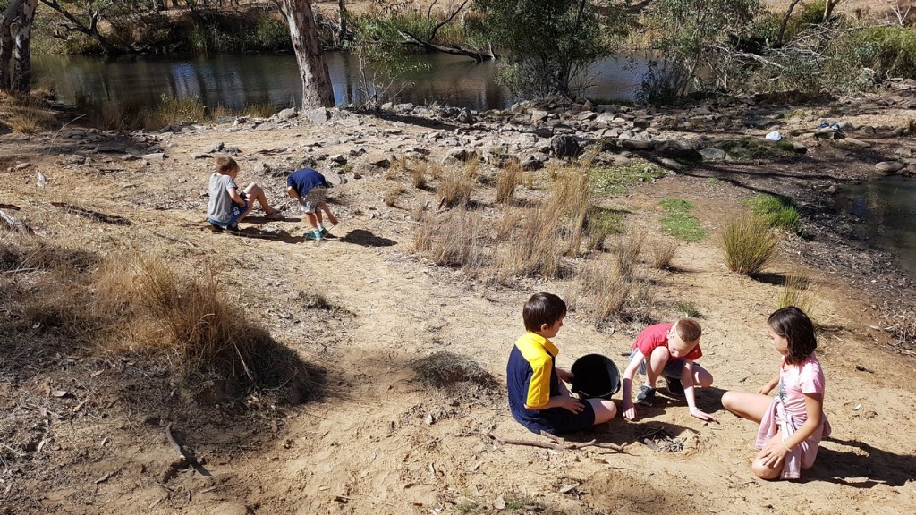 Lunch - you have to cook it! Saturday lunchtime, Cubs here preparing their own camp fires which were checked by Cub Leaders for size, safety (rocks/clear area/water nearby) before they cooked their own hamburgers. 